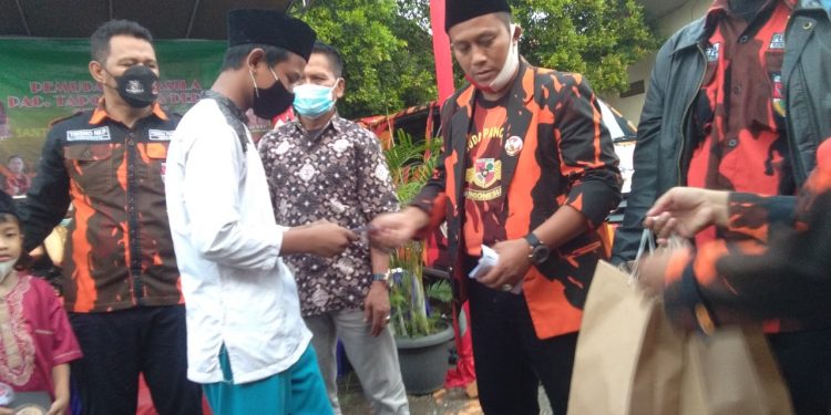 PAC Tapos Santunan  Yatim Piatu dan Bagikan Takjil